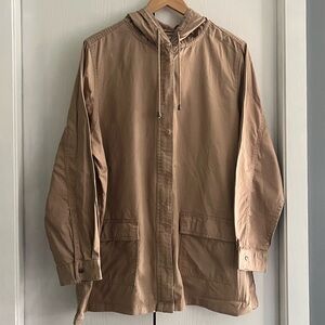 Woman Within Light Brown Hooded Jacket